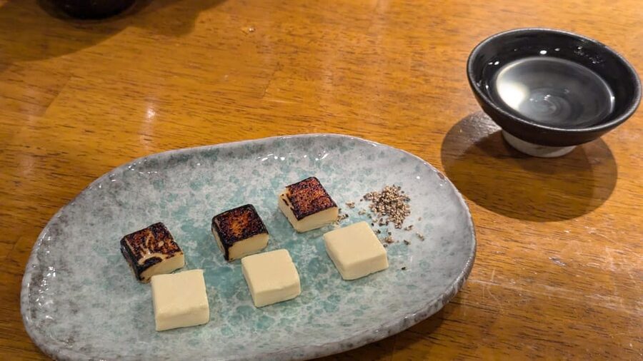 Beyond the Tourist Trail: A VIP Food Tour of Hidden Osaka - Izakaya classics: Tonpeiyaki and seasonal sashimi