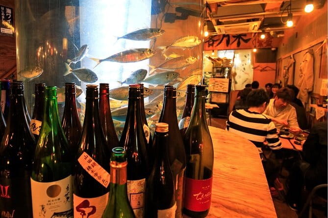 Deep Osaka Local food and bars - Tsutenkaku tower: shooting games, arcades, and a Billiken wish