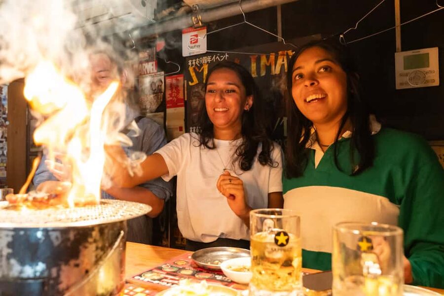 Eat Our Favorites! Osaka’s Backstreet Dining - Tenjinbashi at night: the longest shopping street plus side streets