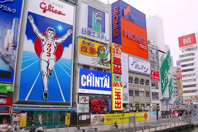 Full Day Walking Tour in Osaka Castle Temples and Ukiyoe - Kuromon Market: where your schedule meets your appetite