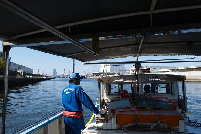 Half day Osaka Bay Area Cycling with E-Assist Bicycle Tour - Shinkizugawa Bridge Views and the Ridley Scott Black Rain Detour
