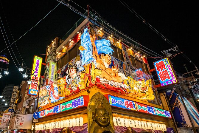 Hidden Osaka - Yukaku Red Light Tour & Culinary Adventure - Shinsekai and Tsutenkaku: eating while walking through an old theme park area