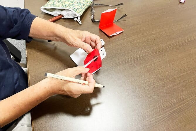 Japanese miniature kimono made with origami in Osaka - The 90-minute flow: practice fold, then your miniature kimono