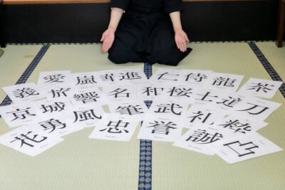 Learning Zen of Japanese Calligraphy in kimono near Osaka Castle