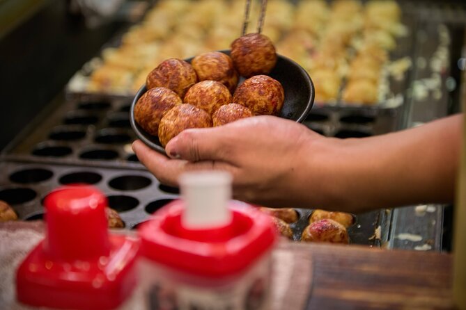 Osaka 2 Hour Local Street Food Tour in Dotonbori and Namba - Dotonbori street food run: takoyaki, takosen, taiyaki, and more