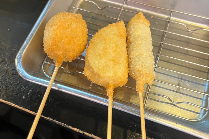 Osaka 2 Hour Local Street Food Tour in Dotonbori and Namba - Namba alley eating: okonomiyaki, kushikatsu, doteyaki, and the sauce factor