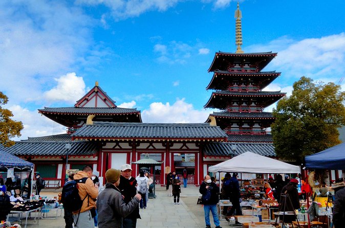 Osaka Castle & Temple Walking Tour with Multilingual Audio Guide - Isshinji Temple and Sanzenbuddha Hall: Statues You Can Actually See