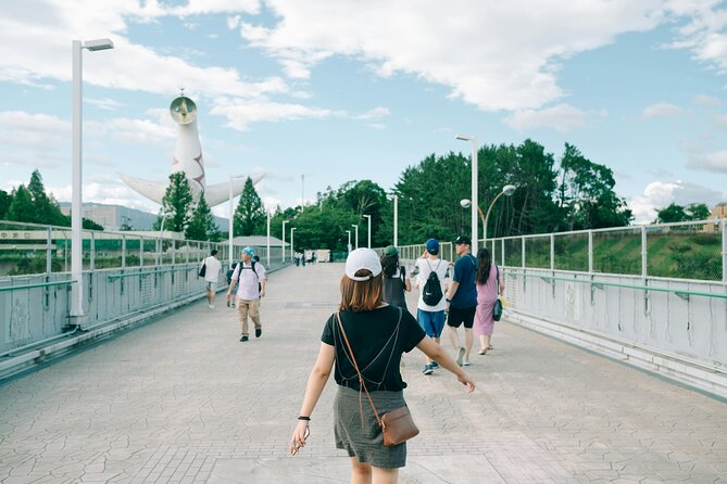 Osaka Commemorative Park Walking Tour - Stop 1: Senribanpakukoen and Banpaku Kinen Koen Station as your warm-up