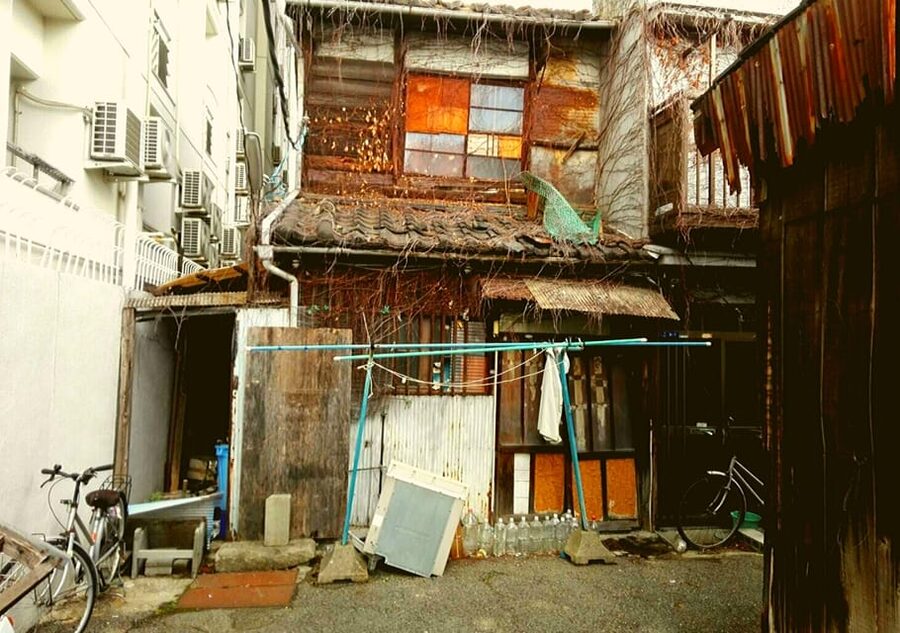 Osaka: Deep Backstreets Walking Tour with Dinner Option - The Start: Retro Osaka and Local Night Entertainment