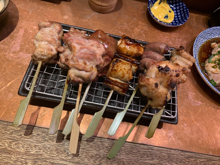 Osaka: Deep Food Tour and Bar Hopping in Namba - Hōzenji Temple in a Commercial District, A Real Mood Switch