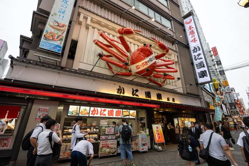 Osaka: Food Tour Kuromon Market & Dotonbori with Guide - Egg Tart Finale: Crisp Crust, Creamy Center