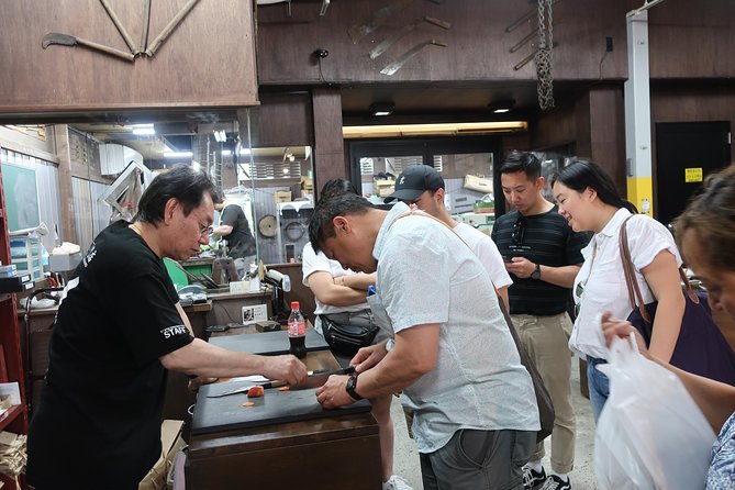 Osaka Food Walking Tour with Market Visit - Tea shop and kitchen knife stop: food culture beyond the plate