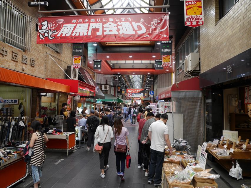 Osaka: Full-Day Sightseeing Tour by Private Vehicle - Dotonbori: Times Square energy, but with side-street context
