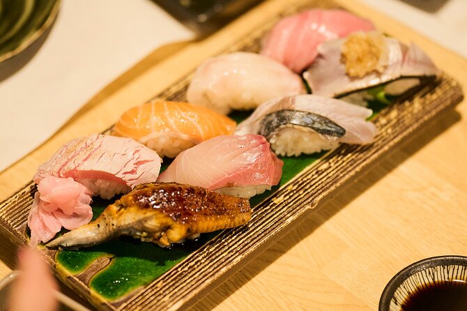 Osaka: Guided Food Tour with 12 Dishes at 4 Local Eateries - What You’ll Eat: Takoyaki, Crispy Dumplings, Fresh Fish, and Skewers