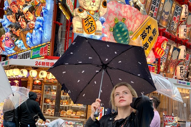 Osaka Highlights: 4Hrs Guided Walking Tour with a Native Expert - Tsutenkaku Tower and Shinsekai street energy, including Janjan Yokocho