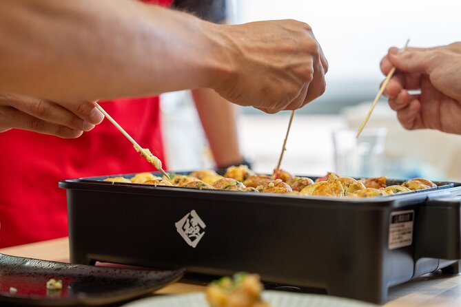 Osaka Home Feast Cooking and Sake Experience - A 4:30 pm Osaka home-food night with a supermarket-to-stove rhythm