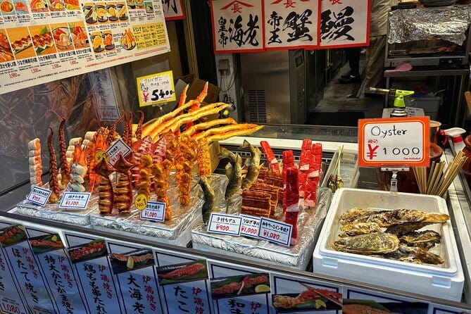 Osaka: Kuromon, Sennichimae & Dotonbori Food Tour - 2hrs - Kuromon Market: Wagyu at Niku and Snack-Sized Wins