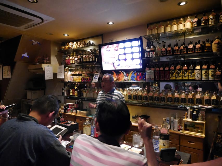 Osaka: LGBTQ+ Tour with Dinner and Drinks - Namba-side street context, where the signs start showing