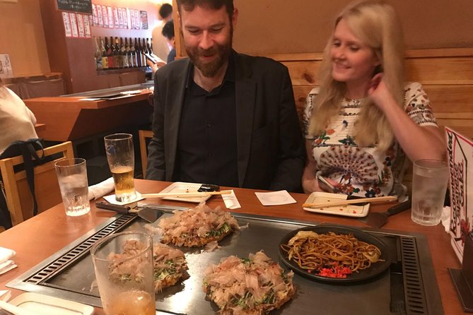 Osaka Local Foodie Walking Tour in Dotonbori and Shinsekai - Stop 2: the shopping street feel, plus old-school Osaka nostalgia
