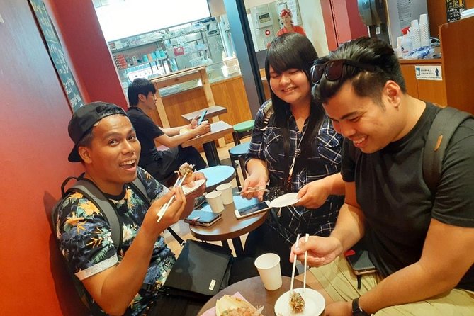 Osaka Local Foodie Walking Tour in Dotonbori and Shinsekai - Stop 5: the Glico sign photo moment