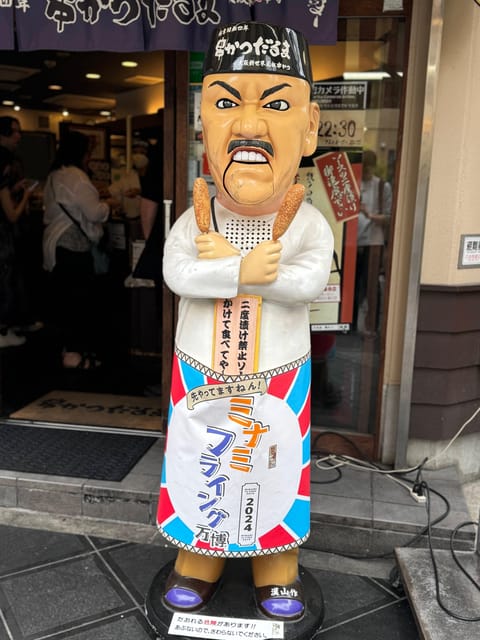 Osaka: Must-See Spots & Hidden Gems 3-Hour Walking Tour - Shinsekai Finale: Tsutenkaku and the Billiken Shrine Photo Moment