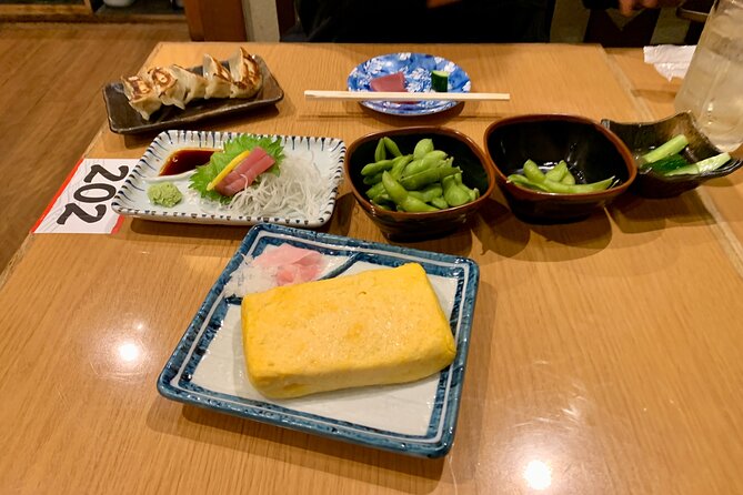 Osaka Nights: Ultimate Pub Bar Crawl with an Expert Local Guide - Rainy nights and short walks: small planning, big comfort