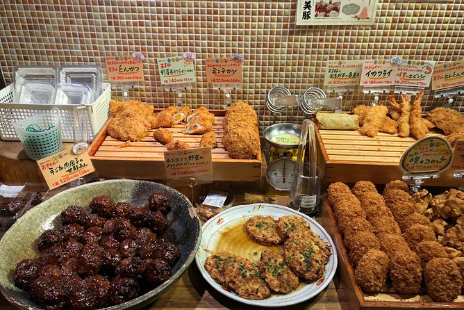 Osaka Private Food Tours by Local Foodies: 100% Personalized - Tsutenkaku Showa-Era Finale with Retro Skewers and Local Beer