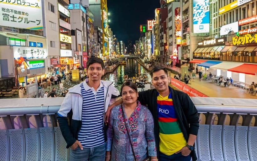 Osaka: Private Vibrant Nighttime Photoshoot (Dotonbori) - The main stops: Ebisubashi Bridge and the Glico Sign