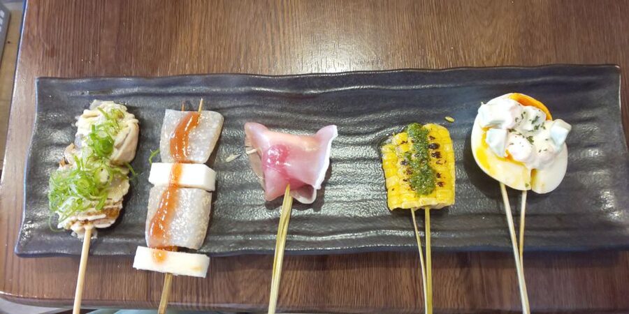 Osaka: Shinsekai Food Tour with 13-15 Dishes at 5 Eateries - Stop 5: Tonpeiyaki, Karaage, Edamame, and a Last Drink Choice