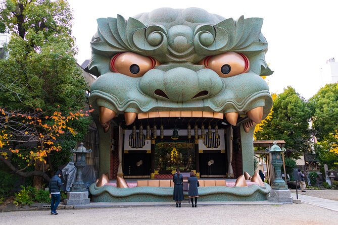 Osaka Unveiled Private Tour: Bustling Streets to Serene Shrines - Stop 3: Osaka Ohsho and the billboard-night feeling